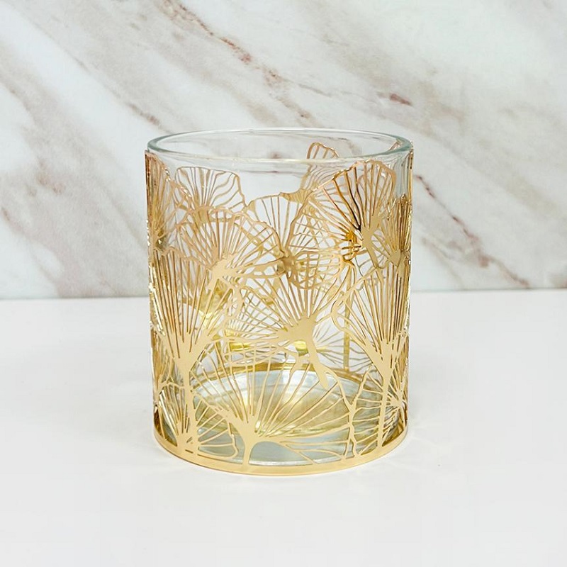 Ang gilded na Gilded Ginkgo Glass Candlestick ay naglunsad, na nagpapaliwanag ng isang bagong kaharian ng mga aesthetics sa bahay.